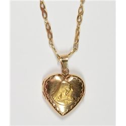 Beautiful 18K Yellow gold locket with Virgin Mary. Space for two pictures. NICE!