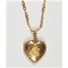 Image 1 : Beautiful 18K Yellow gold locket with Virgin Mary. Space for two pictures. NICE!