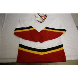 LOT OF 214 WHITE CALGARY JERSIES