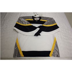 LOT OF 124 WHITE NASHVILLE JERSIES