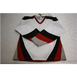 LOT OF 146 WHITE BUFFALO JERSIES