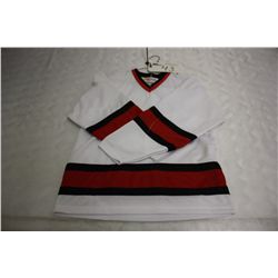 LOT OF 145 WHITE CANADA JERSIES