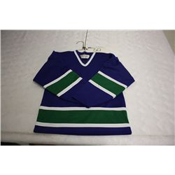 LOT OF 120 BLUE VANCOUVER JERSIES