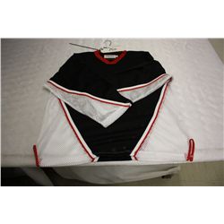 LOT OF 73 BLACK/WHITE ROLLER HOCKEY JERSIES