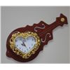 Image 1 : DECORATIVE VINTAGE STYLE VIOLIN SHAPED QUARTZ WALL CLOC
