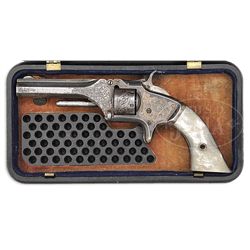 FACTORY ENGRAVED SMITH & WESSON GUTTA-PERCHA CASED MODEL #1, SECOND ISSUE REVOLVER WITH PEARL GRIPS.
