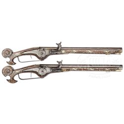 VERY ATTRACTIVE DECORATIVE PAIR OF SCROLL BUTTED WHEEL LOCK HOLSTER PISTOLS, 17th CENTURY AND LATER.