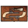 Image 1 : CASED PAIR OF MINIATURE BELGIAN SCREW BARREL PERCUSSION MUFF PISTOLS.