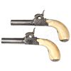 Image 2 : CASED PAIR OF MINIATURE BELGIAN SCREW BARREL PERCUSSION MUFF PISTOLS.