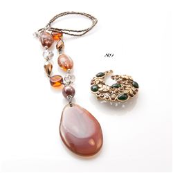 Ladies costume jeweled polished amber stone