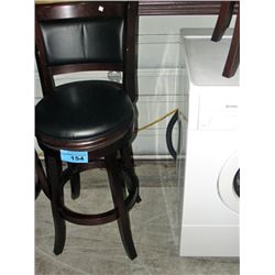 Swivel bar stool with black padded leather seat