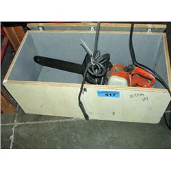 Stihl chain saw in wood box with 3 spare chains