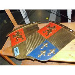 2 brass coat of arm sheilds with lion motiff