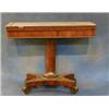 Image 1 : A William IV mahogany rectangular card table raised on a chamfered column with triform base and s...