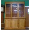 Image 1 : A Victorian honey oak library bookcase on cabinet the moulded cornice above a triple bookcase enc...