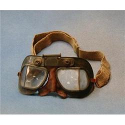 A pair of WWII Air Ministry flying goggles, marked AM220/826 2023 £50-75...