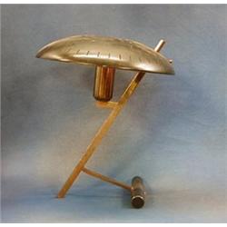 A brass and metal table lamp by Pierre Paulin for Philips ILLUSTRATED  £150-200...