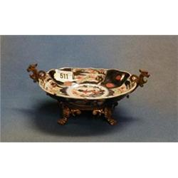 A 19th Century Japanese Imari porcelain oval shaped dish with lobed borders and panel decoration,...