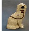 A Victorian Staffordshire figure of a seated Spaniel 9" (crack to the base) ILLUSTRATED  £20-40...