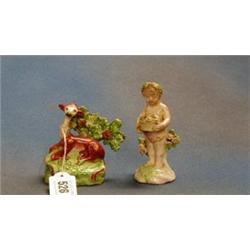 An 18th/19th Century Staffordshire figure of a seated deer with arbour 3" and a 19th Century Staf...