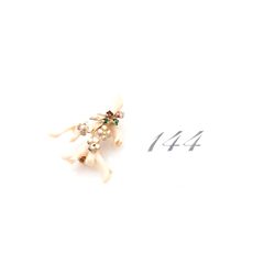 Yukon ivory jeweled pin
