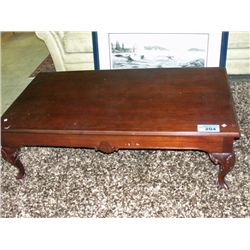 Mahogany ball and claw foot coffee table