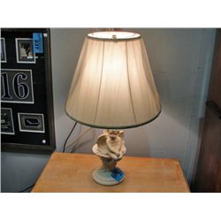 Ceramic cupid based table lamp