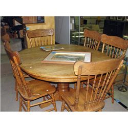 Single pedastol oak dining table with one leaf and