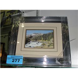 Framed print titled the rivers path by artist