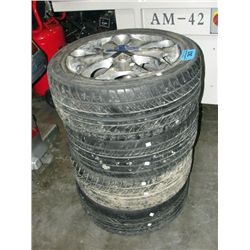 Set of 4 falken low profile tires with diablo rims