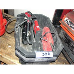 2 black tool carrying boxes with 2 jigsaw