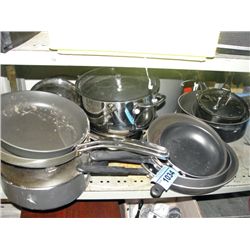 Shelf lot of kitchen wares; pots, pans, etc