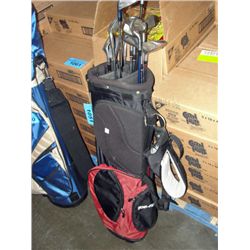 Black and red golf bag filled with assorted golf