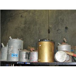 Shelf lot of vintage gas cans, oil cans, bug