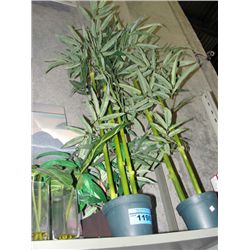 Shelf lot of artificial tropical plants