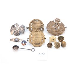 Small box of vintage badges and pins