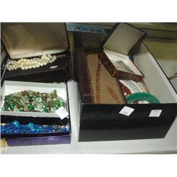 2 boxes full of assorted costume jewelry