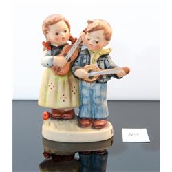 Hummel figurine titled happy days made in west