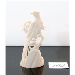 Genuine carved ivory bird figurine