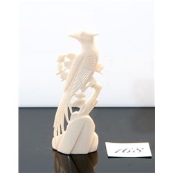 Genuine carved ivory bird figurine