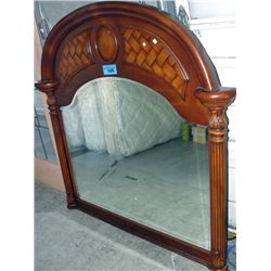 Large wood framed bevelled mirror