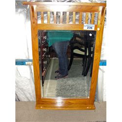 Oak framed bevelled wall mirror