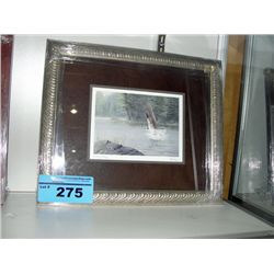 Framed print titled fishing osprey by artist