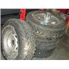 Image 1 : Set of 4 mismatched tires with 3 dodge ram rims