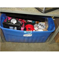 Large blue storage bin filled with assorted
