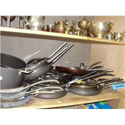 Shelf lot of assorted cookware; pots, pans etc