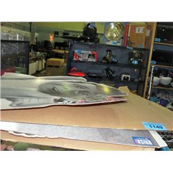 Shelf lot of assorted pepsi cola advertisment