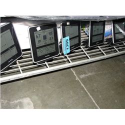 Shelf lot of digital weather stations approx 11