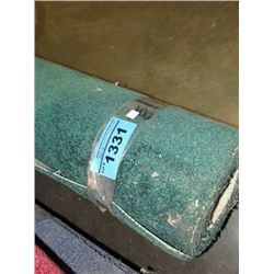 One roll of green new carpeting