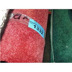 One roll of rose colored new carpeting